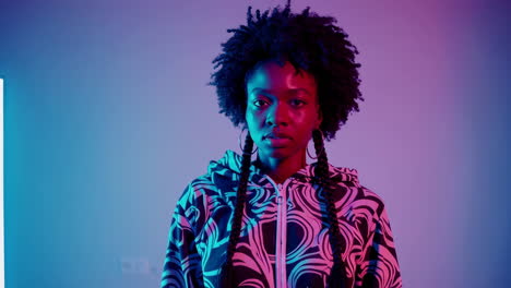 portrait of a young woman in neon lights