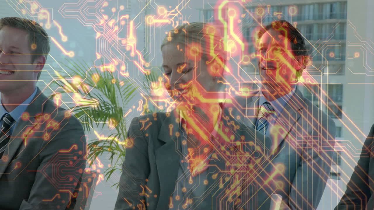 Business professionals standing in modern office space, analyzing digital circuit overlay and plant