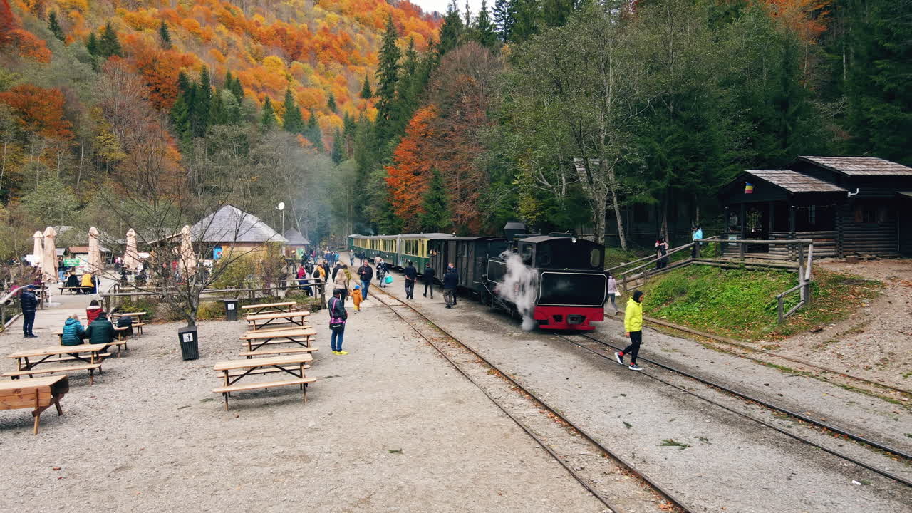 Scenic Autumn Railway with People
