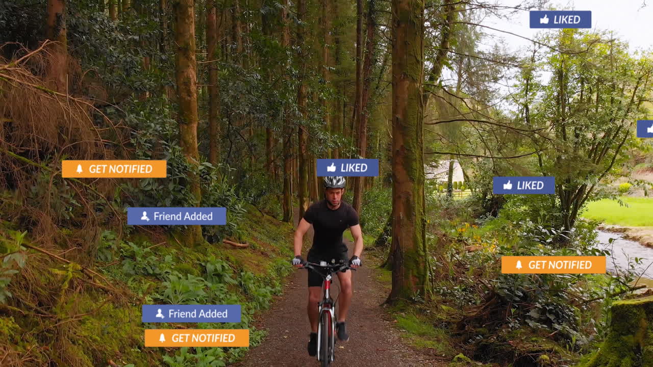 Animazione di icone di social media su una vista aerea di un ciclista maschio caucasico che va in bicicletta nella foresta