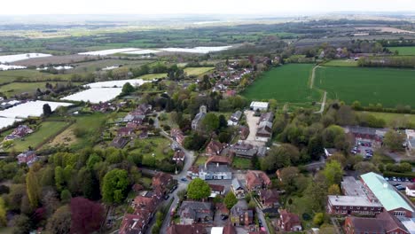 Drone-footage-flying-towards-a-church-in-a-village-in-Kent