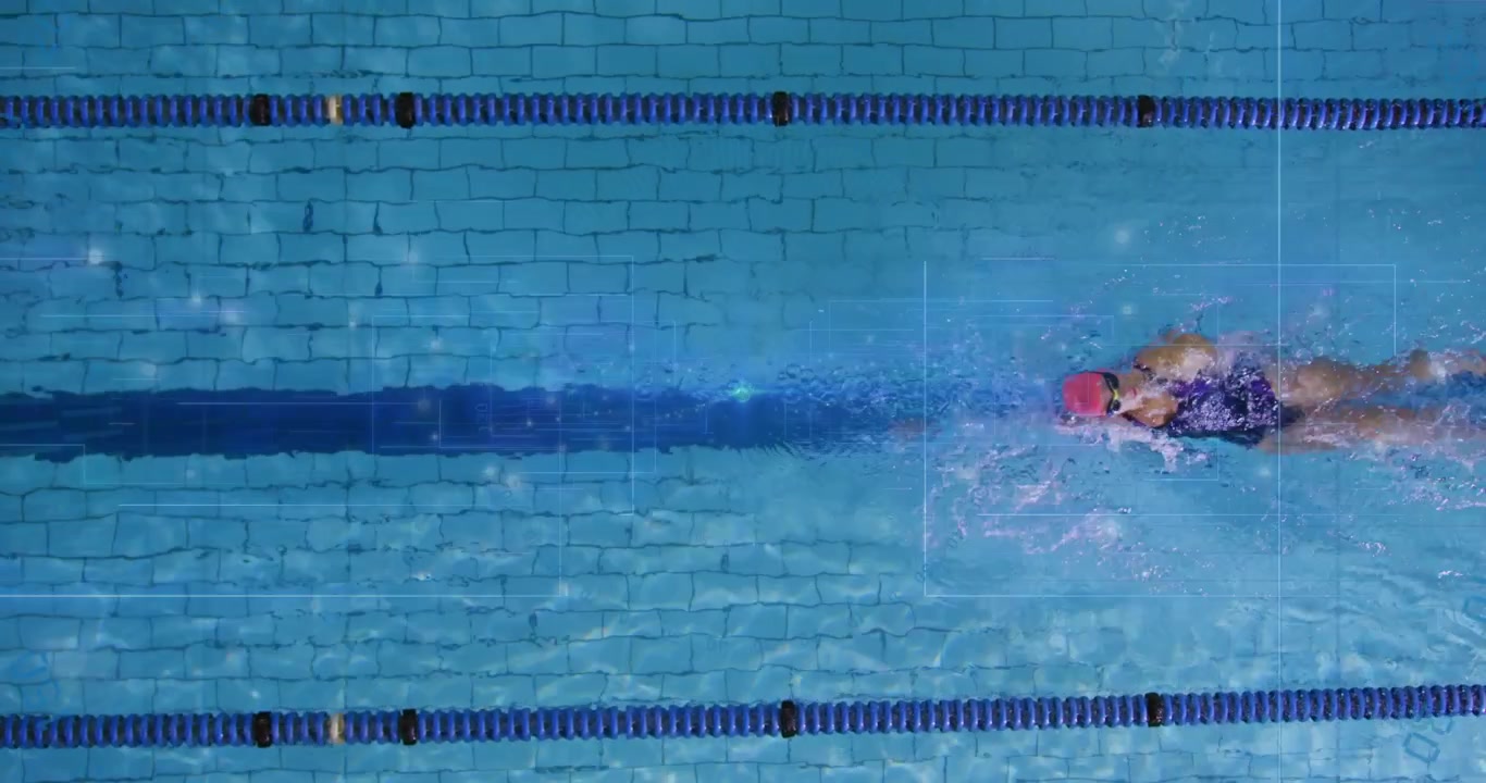 Woman entering lane and powering freestyle stroke in swim training with digital tracking overlays