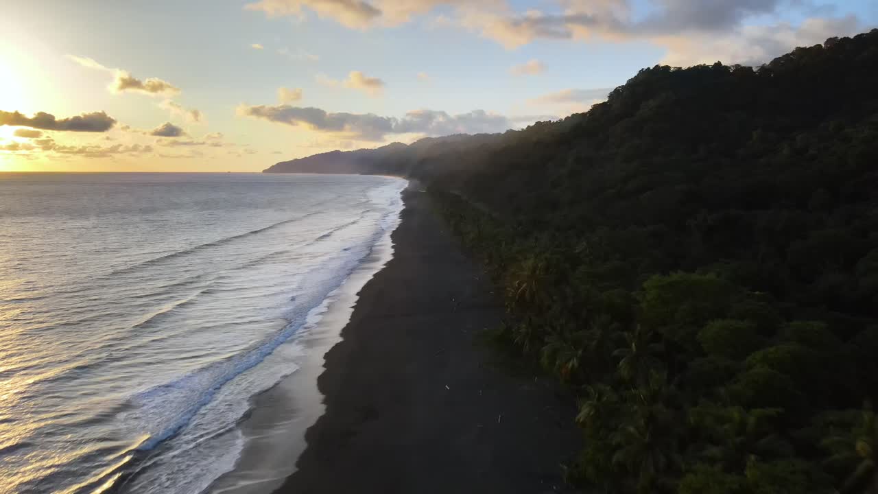 Sunset over Tropical Black Sand Beach