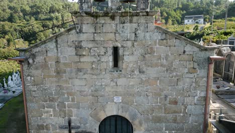 drone ascends iglesia san martino de alongos, toen ourense galicia spain