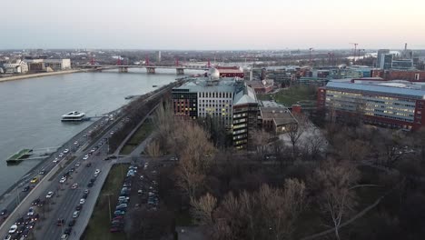 aerial view of star observatory and traffic during sunset at budapest with the city and river danube in the background