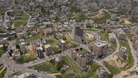 aerial drone view of high rise residential buildings at ramallah city, palestine