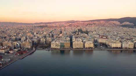 thessoloniki greece waterfront after sunset entering evening - night time- raise up