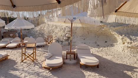 Blue-flag-beach-club-in-Izmir-Cesme-Alacati,-beach-umbrellas,-chairs,-beach-party-in