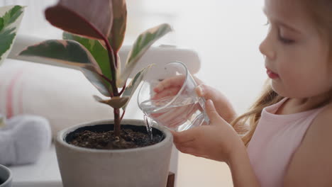 little girl watering plant at home giving water nurturing growth child enjoying responsibility for nature 4k