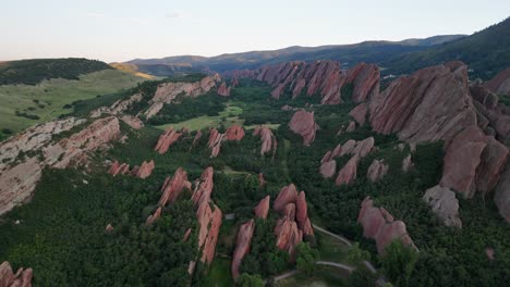 aerial descends to unique eroded, slanted sandstone fins in foothills