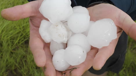 giant hail stones in hand extreme severe weather power of nature