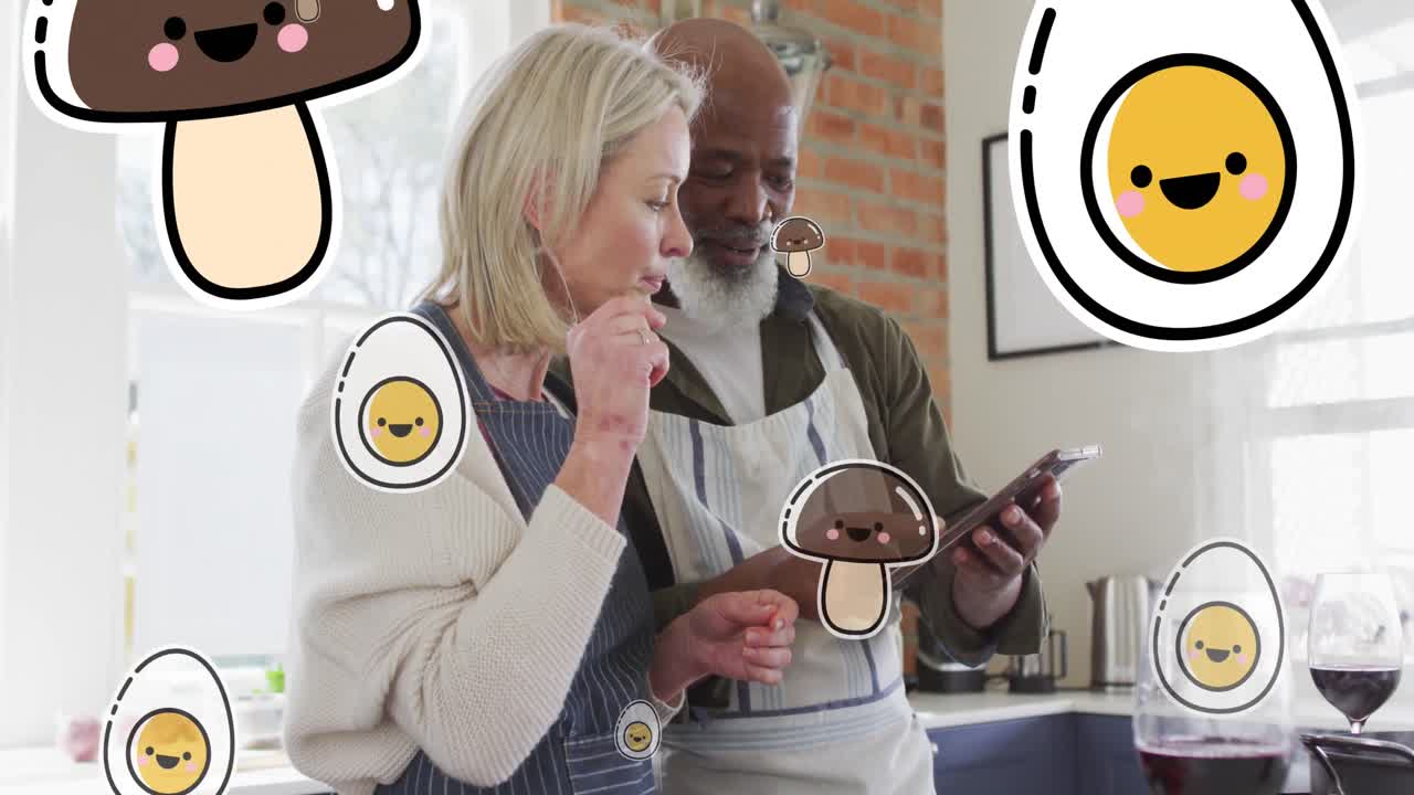 Animation of food icons over diverse couple using tablet in kitchen