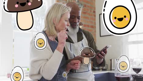 animación de iconos de alimentos sobre una pareja diversa usando una tableta en la cocina