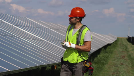 solar panel technician performing maintenance