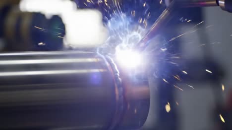 precision welding process in action: a close-up view of automated welding techniques with sparks and metalwork creation