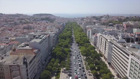 sunny day lisbon city marquess of pombal square traffic street panorama 4k portugal