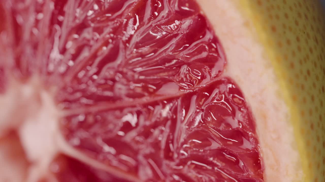 Vertical video of a close-up macro grapefruit for background