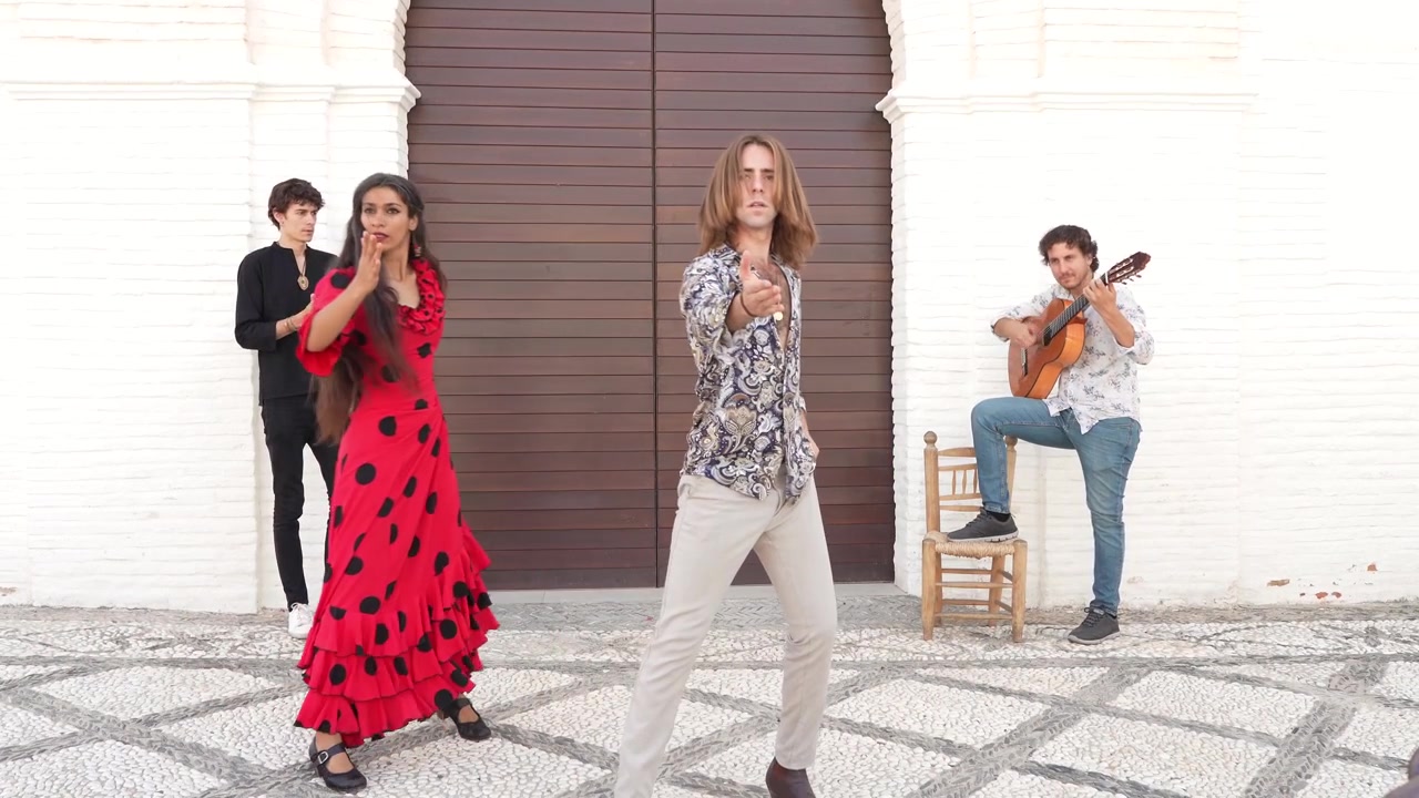 Multiethnic group of flamenco dancers dancing for tourists in san nicolas albaicin
