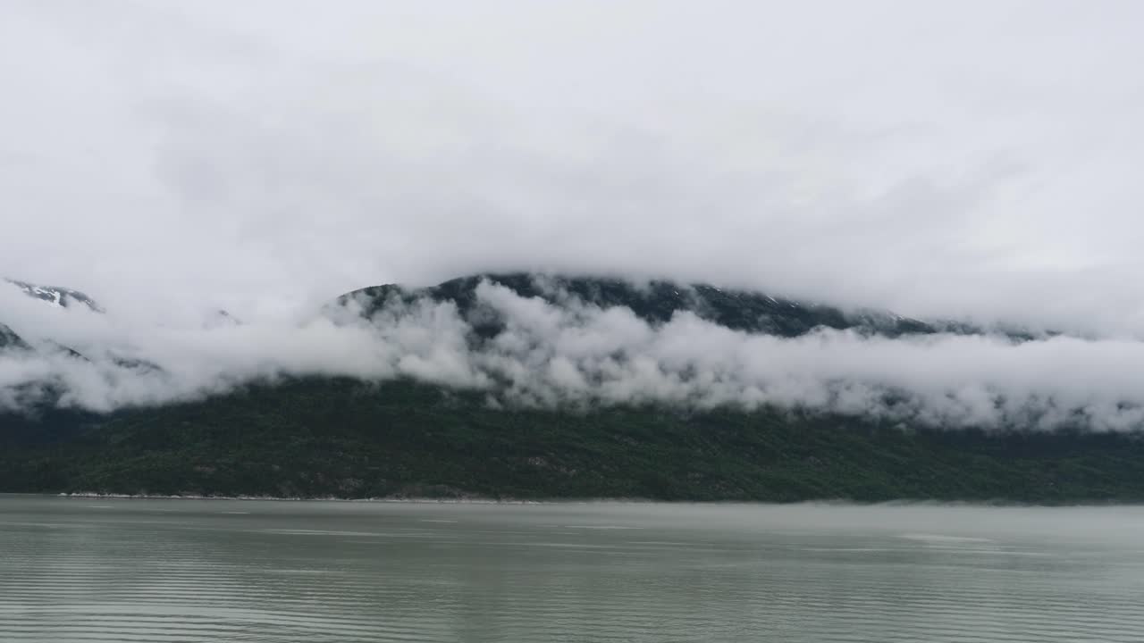 Heavy fog covering top of the mountains surrounding Skagway, Alaska.