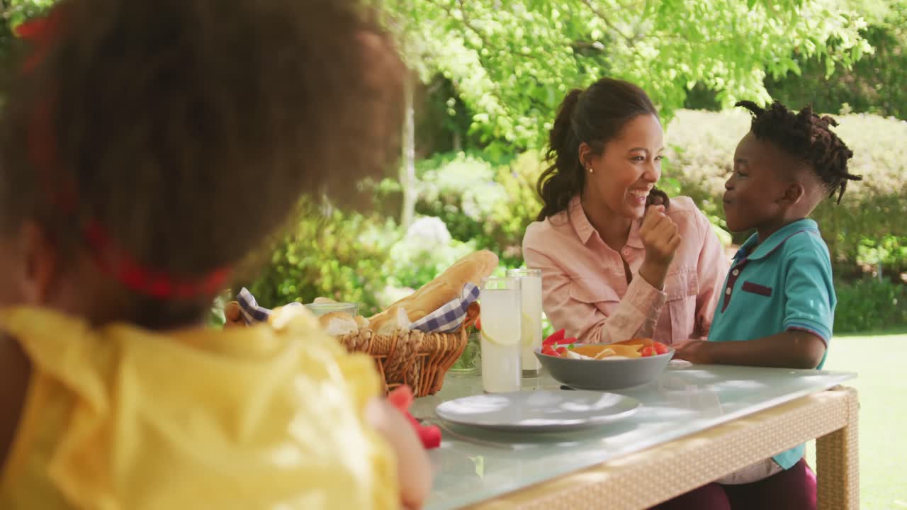 African American girl spending time in garden