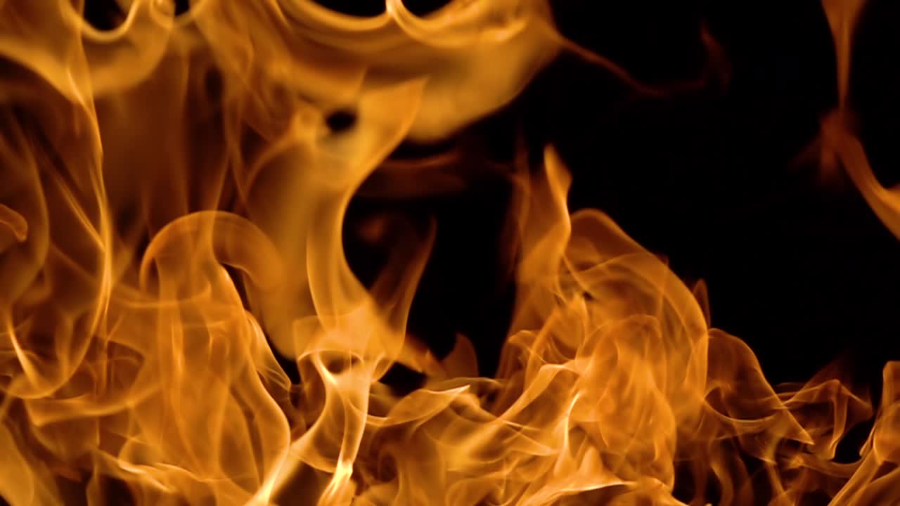 Flames of fire on black background in slow motion