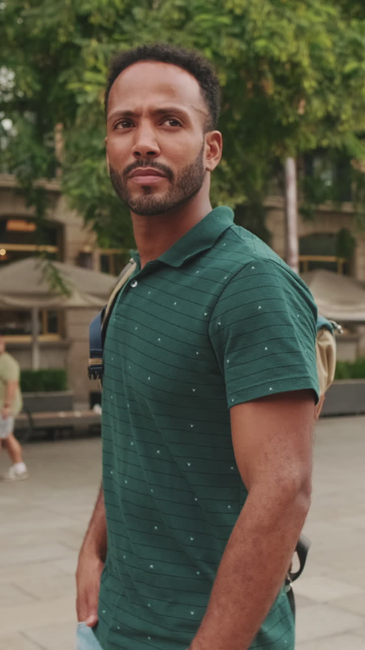 Man in green polo shirt