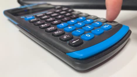 Type numbers into a calculator to make a calculation