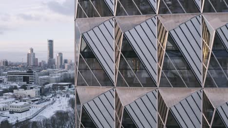 modern skyscraper in a snowy city