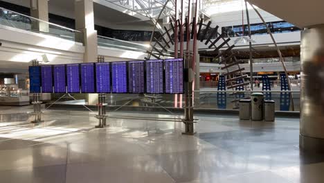 airport arrival and departure screens at denver international airport