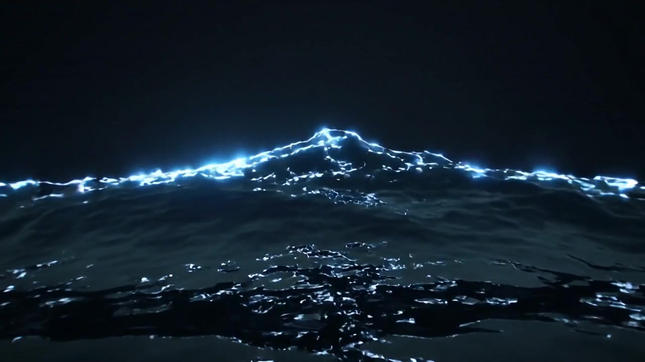 Faint electric-blue rim appearing, cresting ocean wave rolling on surface at night, scattering glow