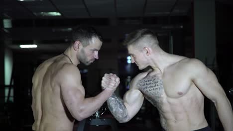 arm wrestling competition in a gym