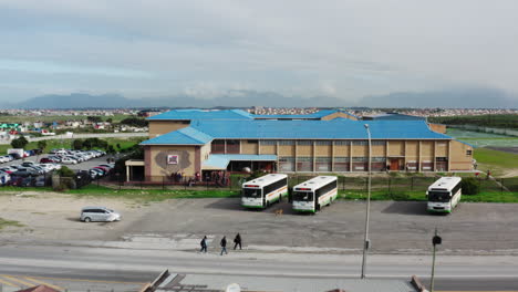 aerial view tracking out of school in khayelitsha, cape town