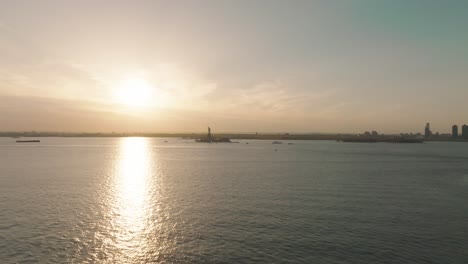 Iconic-statue-of-Liberty-under-sunset-sky,-New-York,-United-States