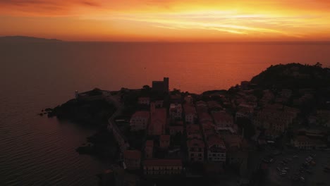 Talamone,-a-fishing-village-with-an-old-castle-close-to-National-Park-Maremma-in-Tuscany,-Italy