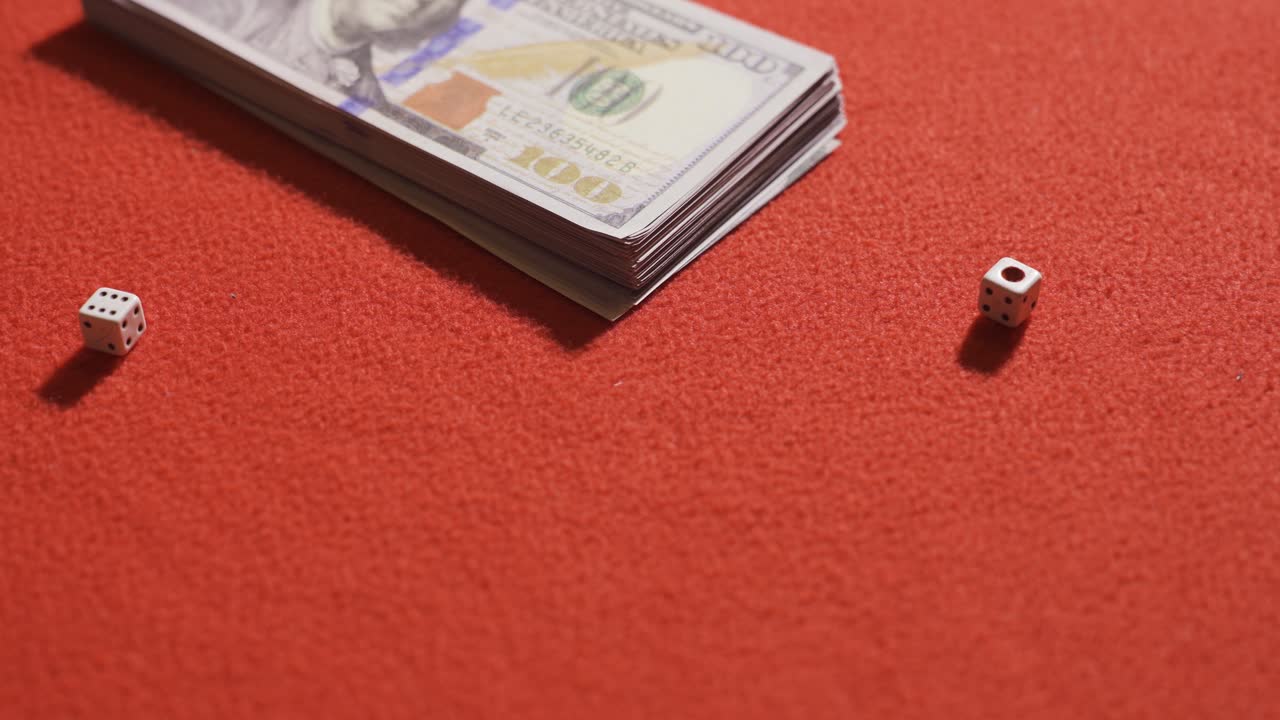 Rolling dice in gambling. Bets and dice at the gambling table.