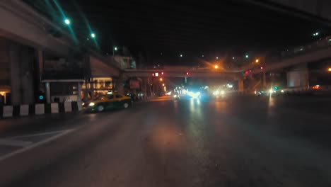 watching cars on the traffic lights in bangkok at night