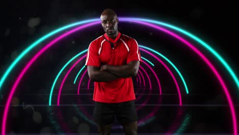animation eines porträts eines afroamerikanischen sportlers über rosa und blaue neonbögen