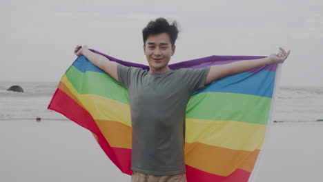 man with rainbow flag