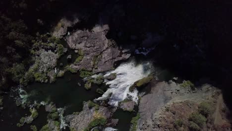 Flying-back-out-of-waterfall-in-a-canyon-in-Northern-California-Lassen-County