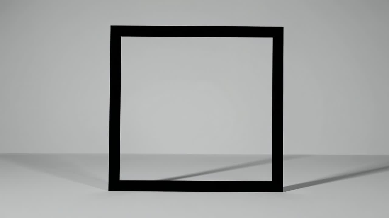 Minimalist black frame on a gray background, captured from a straight-on angle