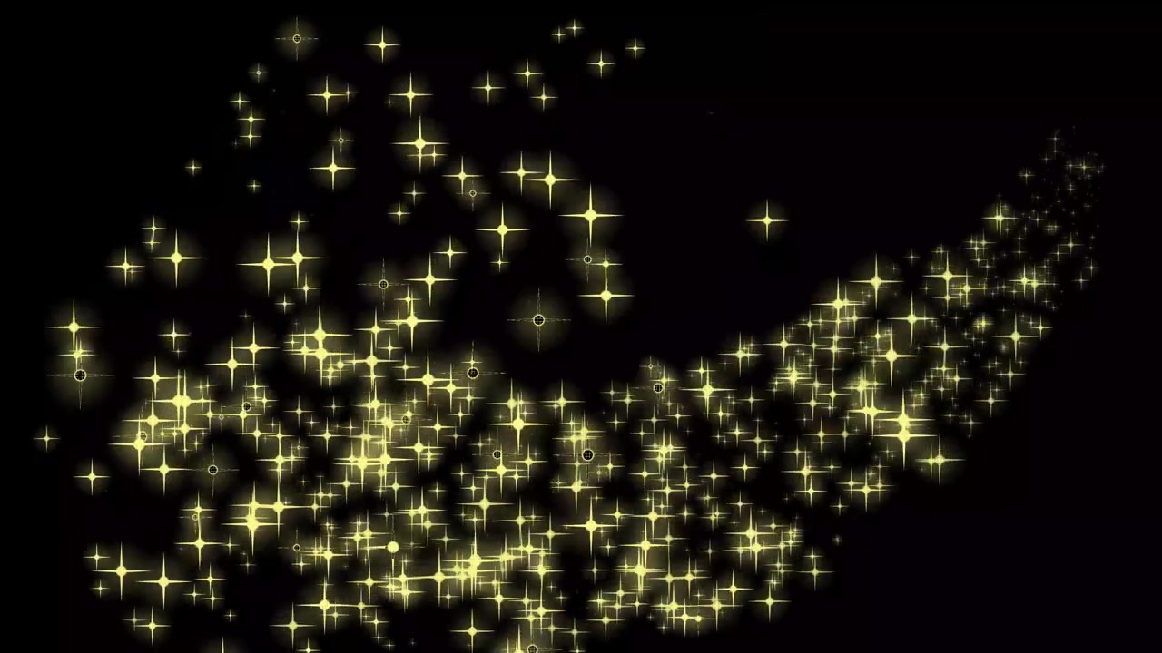 Particelle di stelle dorate animate che scorrono su sfondo nero.