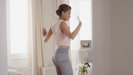 young-woman-dancer-having-fun-practicing-cool-hip-hop-dance-moves-at-home-celebrating-enjoying-dancing-4k