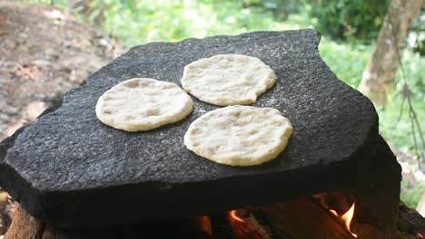 Coconut-roti-making-on-a-stone-in-Sri-Lanka