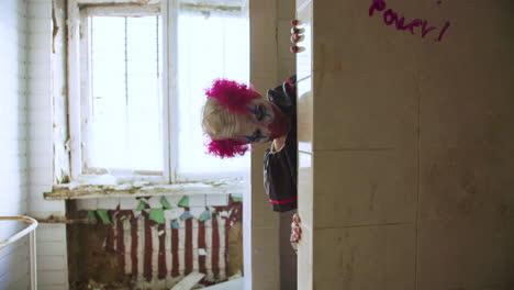 scary clown in abandoned house