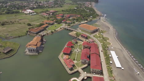 dolly in aerial footage of old houses in las casas filipinas de acuzar