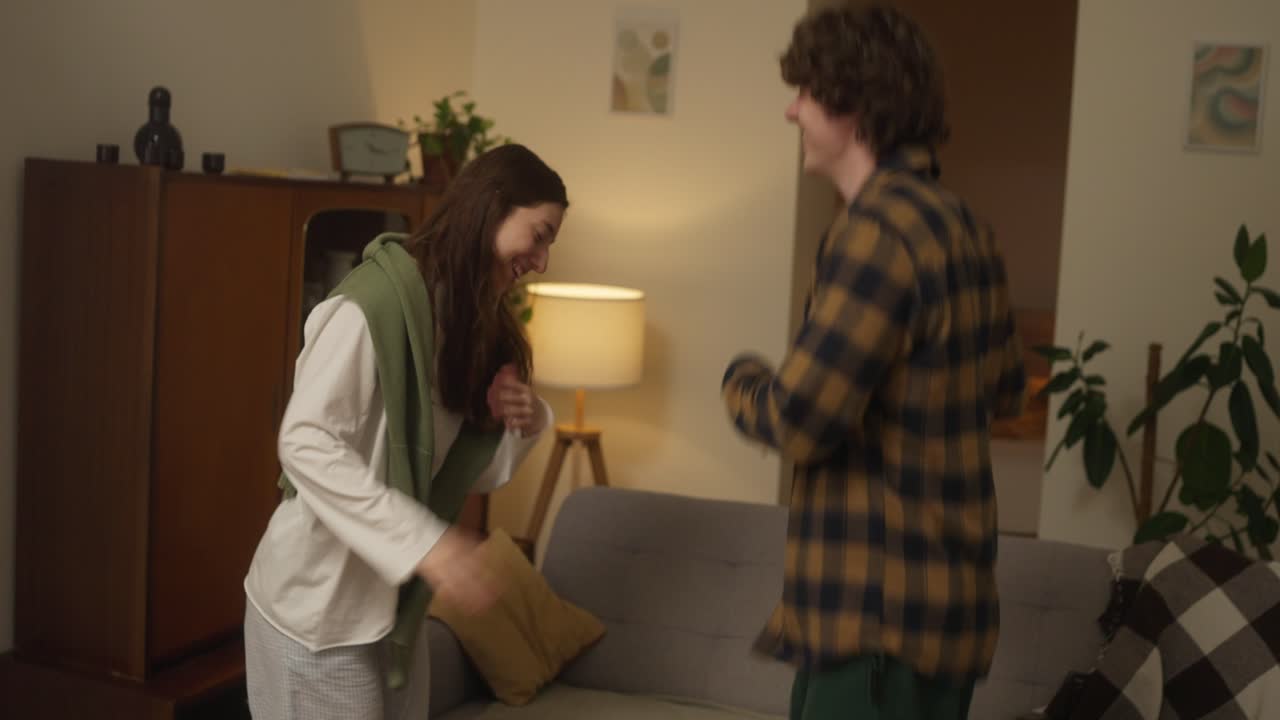 Couple Dancing in Living Room