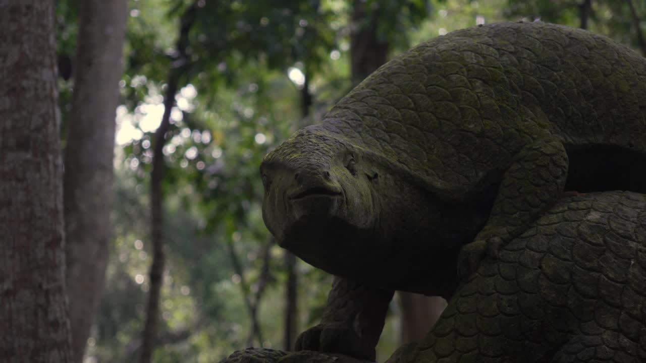 Lizard sculpture in Bali Monkey Forest Ubud Balinese heritage culture Indonesia