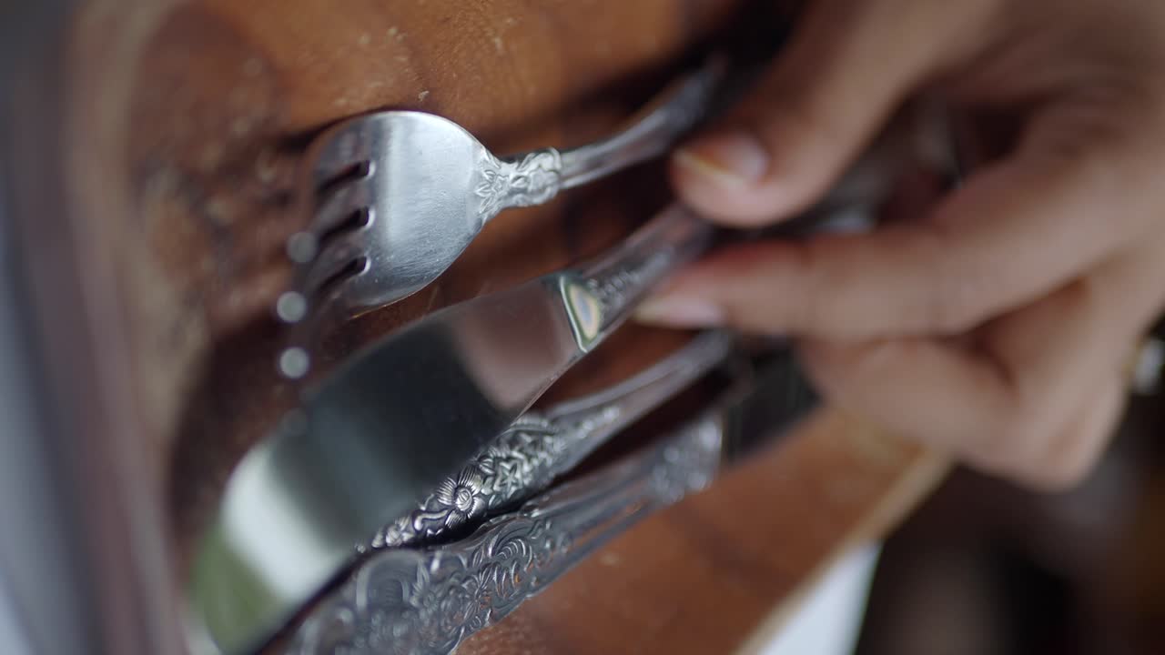 Close-up of Cutlery on Wood