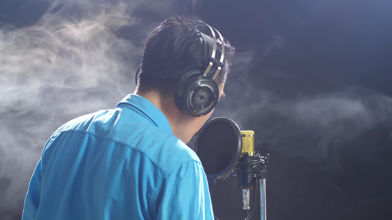 Singer Recording in a Studio