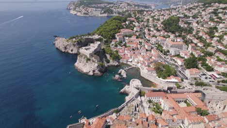 dubrovnik's west harbour: aerial of coastal old town and adriatic sea